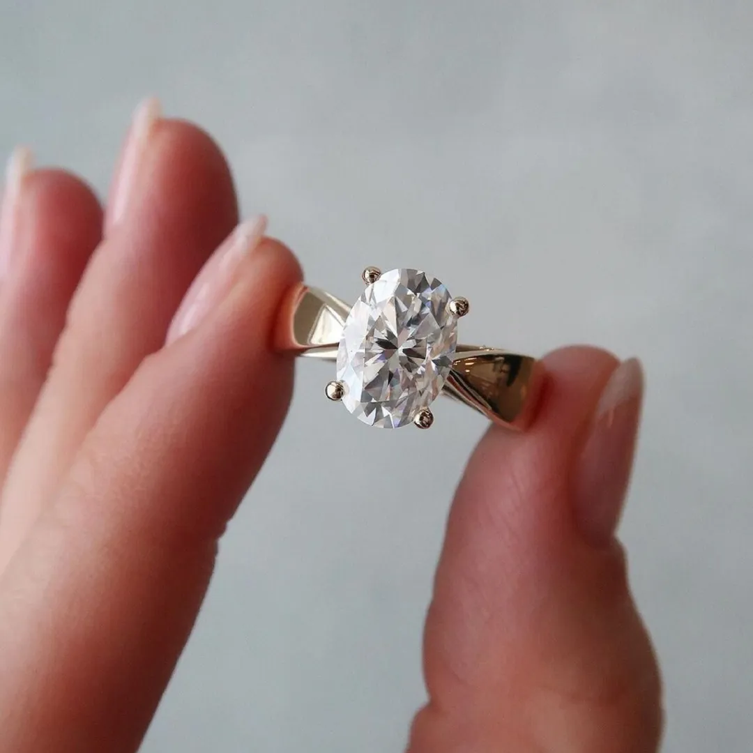 /public/photos/live/Wide Band Oval Cut Solitaire Moissanite Ring 513 (1).webp